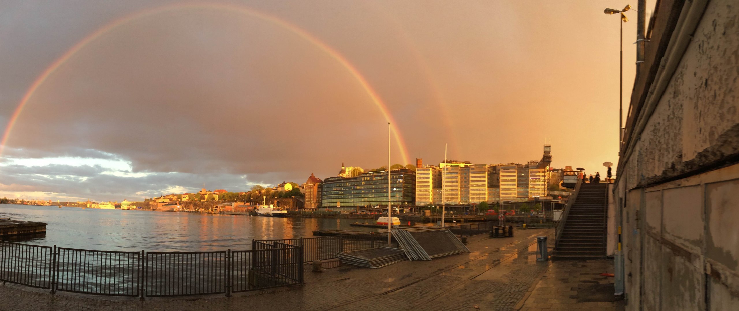 A group of students looking out over a scenic valley on a faculty-led study abroad trip.